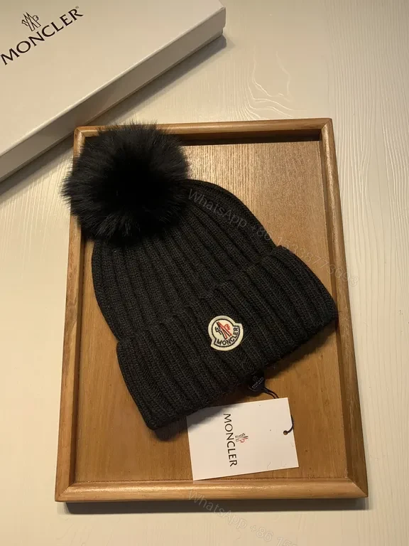 View 9 of Moncler Wool-Blend Beanie with Faux-Fur Pom, Black, Luxury Style