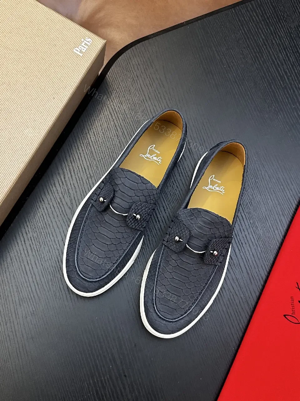View 8 of black crocodile-embossed leather loafer with tassel slip-on for everyday luxury