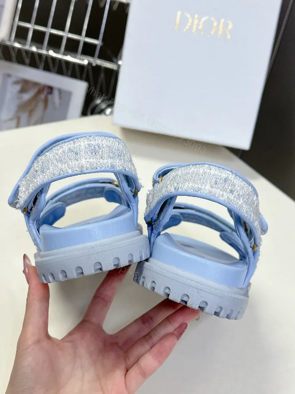 View 8 of Soft-Gleam Crest Sandals: Light-Blue Textured Straps, Minimal Logo