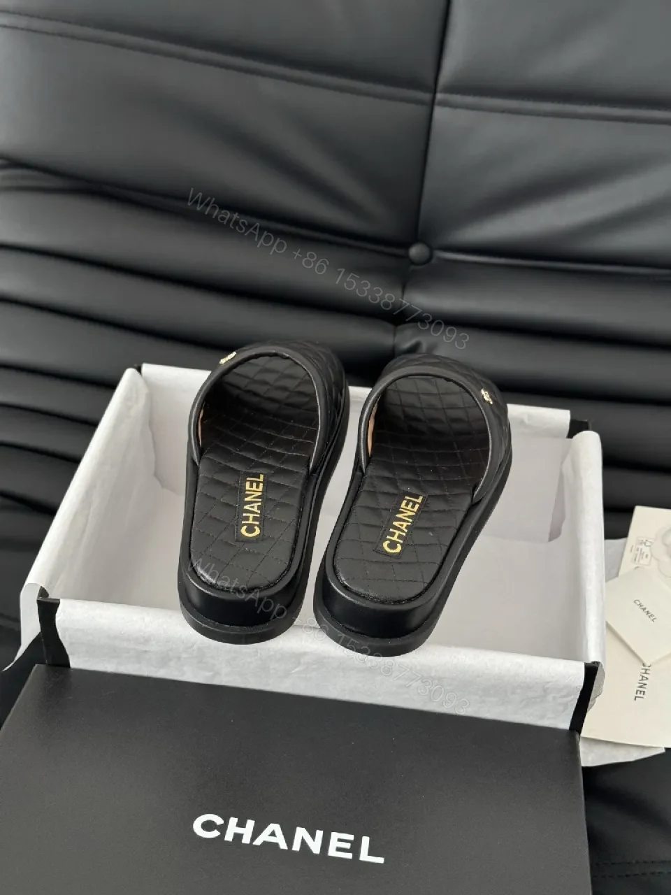 View 4 of Quilted Black Slip-Ons with Gold Logo - Luxe Comfort Shoes