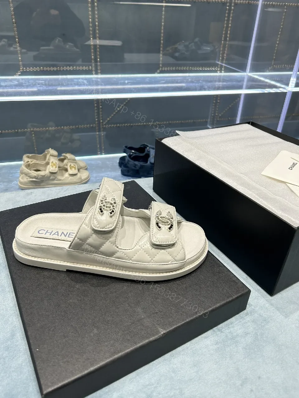 View 4 of Chic White Sandals with Quilted Straps and Logo Hardware