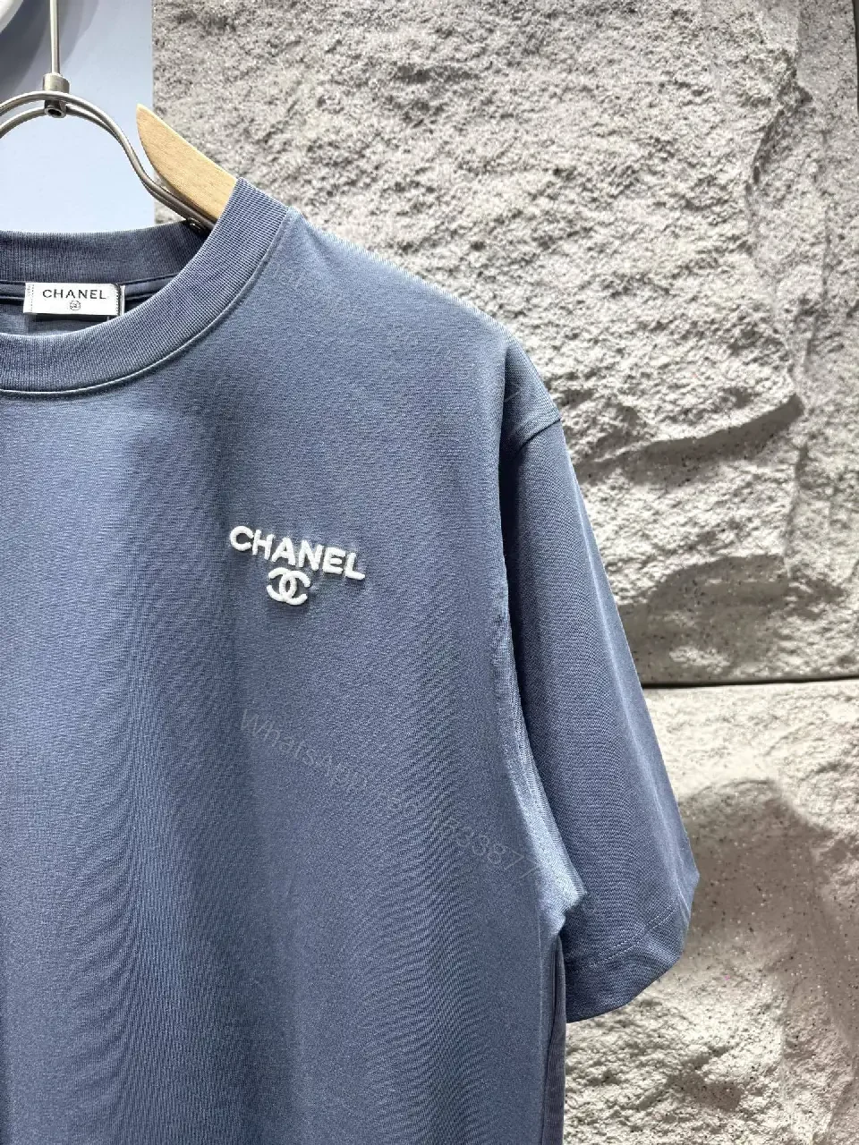 View 3 of Navy Knit Tee: Subtle Crest, Luxe Texture, Relaxed Fit Top