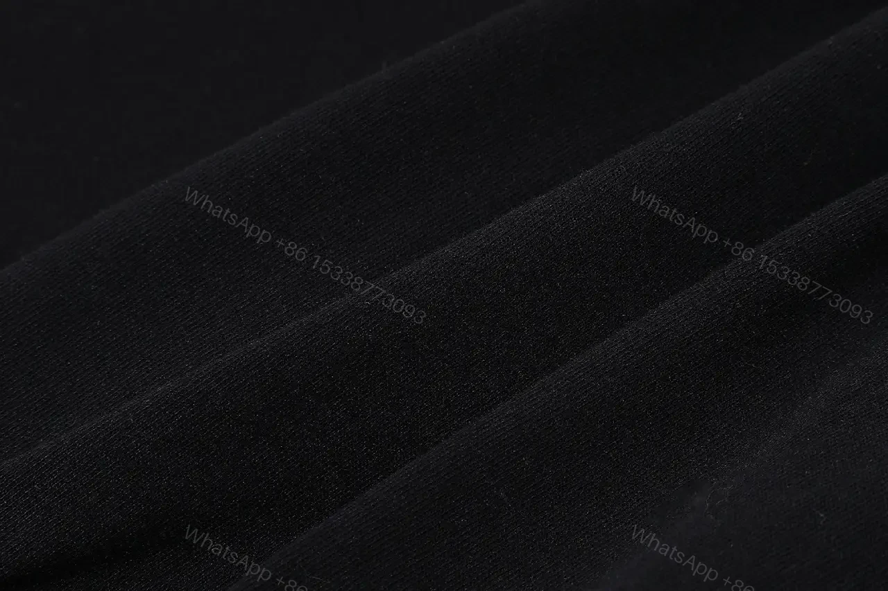 View 8 of Black Cotton Minimalist Tee – Subtle Chest Logo, Premium Essential