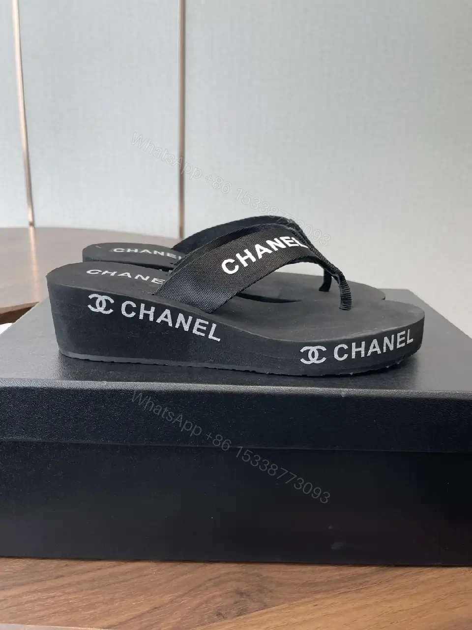 View 10 of Minimalist Black Luxe: Couture-Inspired Flip-Flops with Subtle Logo