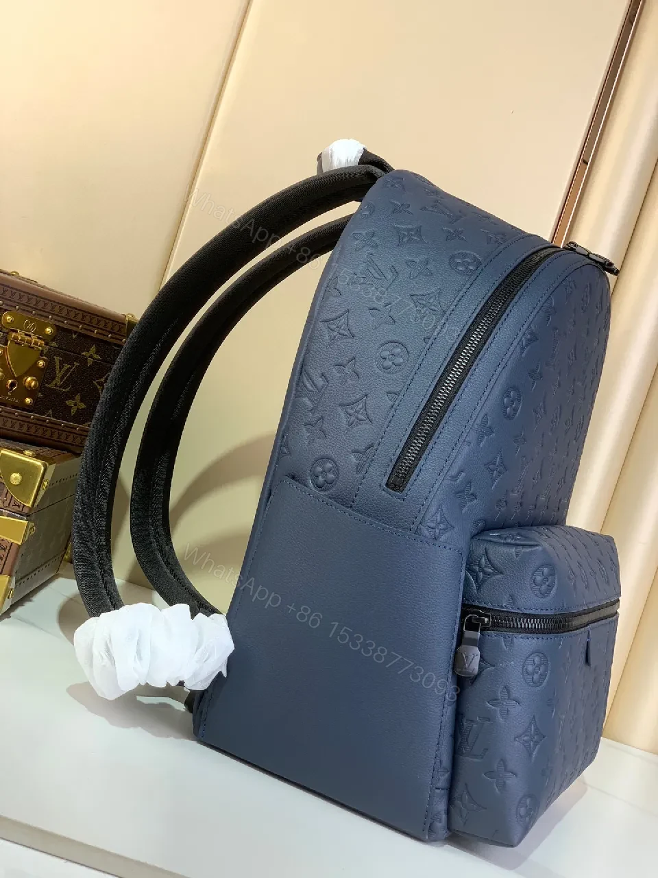 View 9 of Compact Monogram Backpack: Textured Luxury, Everyday-Ready
