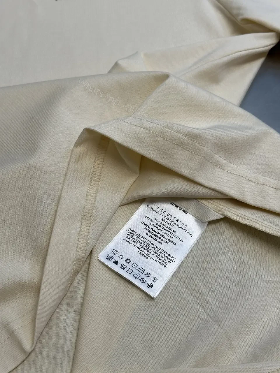 View 3 of Cream Off-White Silk-Soft Tee with Small Chest Logo Tee