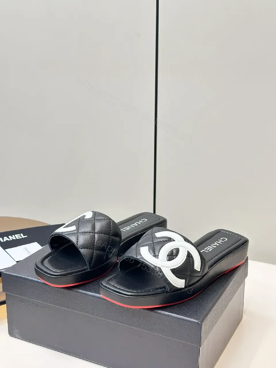 View 8 of Black Quilted Chanel Sliders with White Logo, Slide Sandals