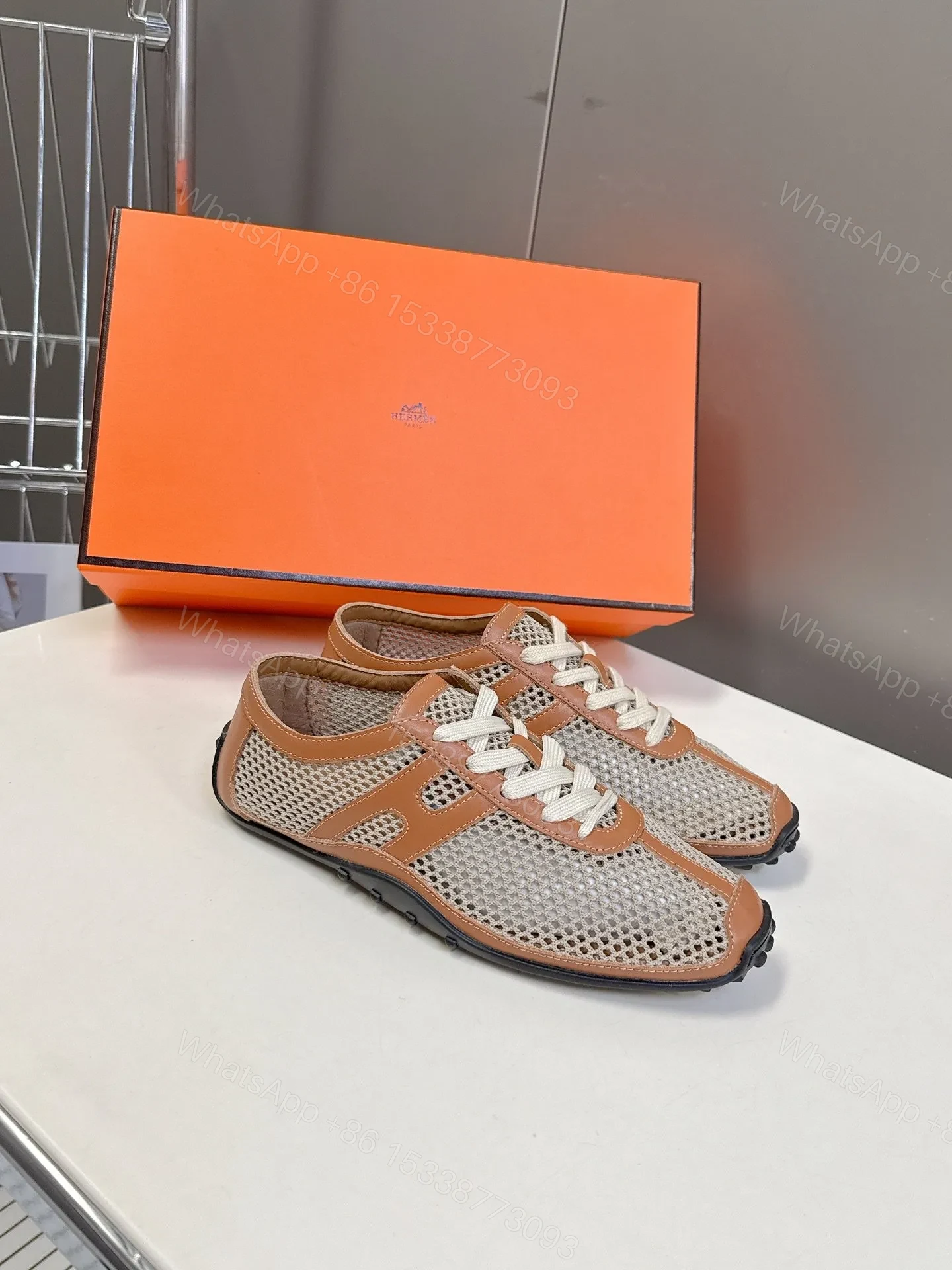 View 3 of Hermes Women Beige Mesh And Tan Leather Sneakers