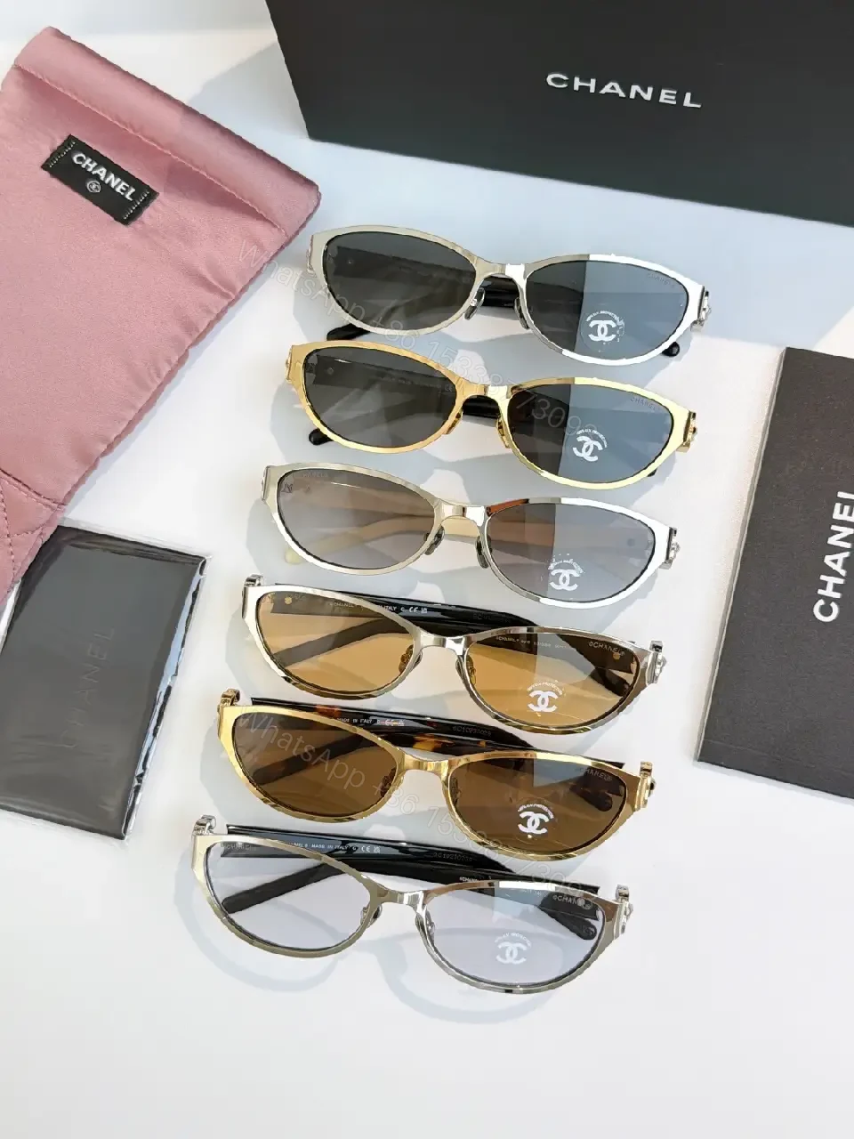 View 6 of Gold Cat-Eye Sunglasses with Chanel Logo Accents