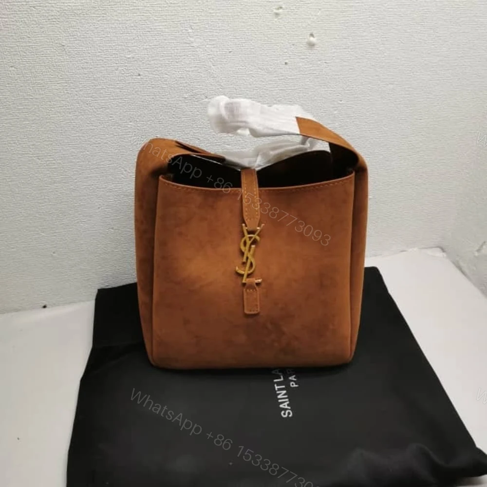 View 3 of Saint Laurent Le 5 À 7 Supple In Suede Golden Brown 24Cm