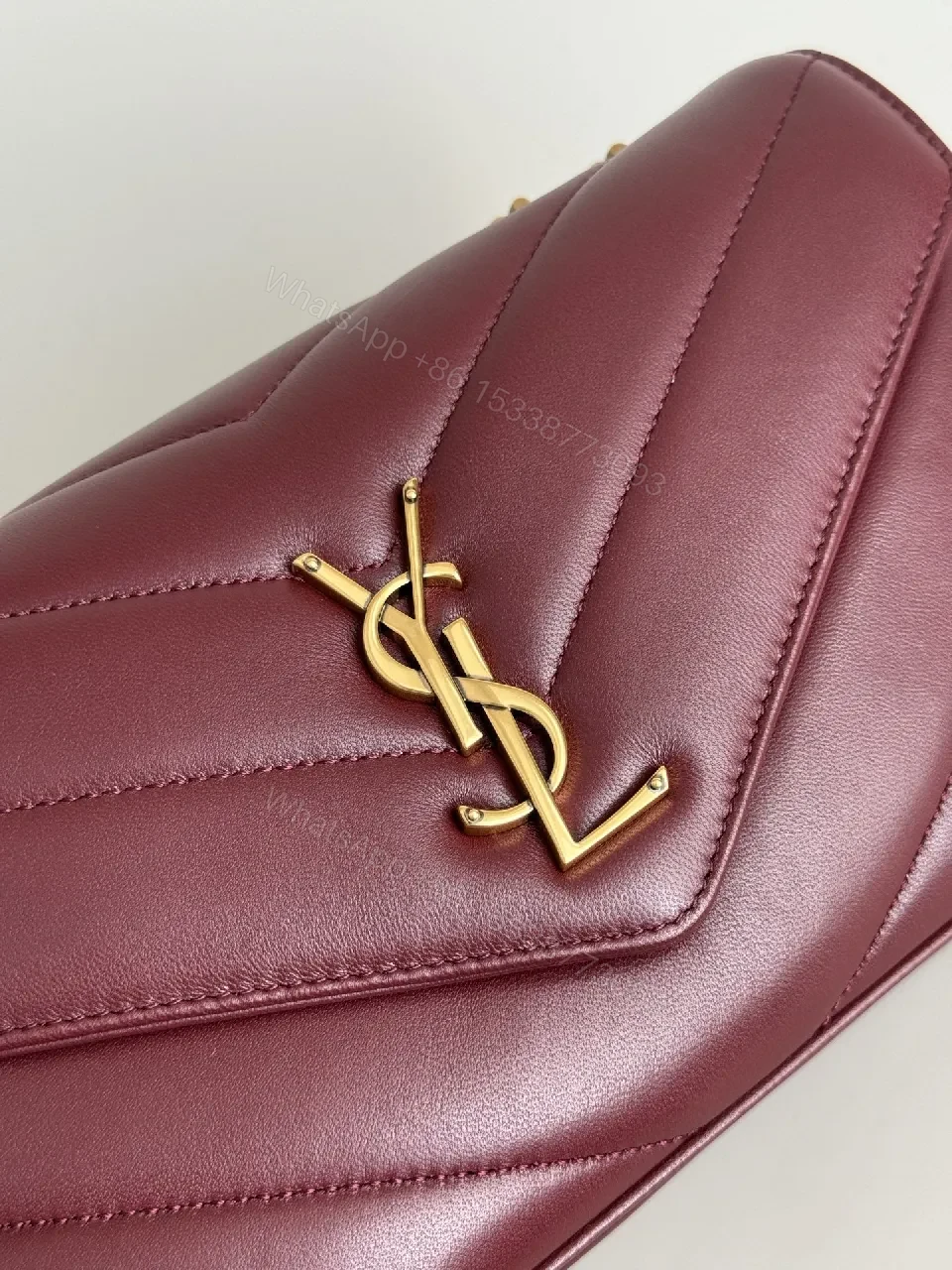 View 6 of Burgundy Quilted Satchel with Gold Chain Detail