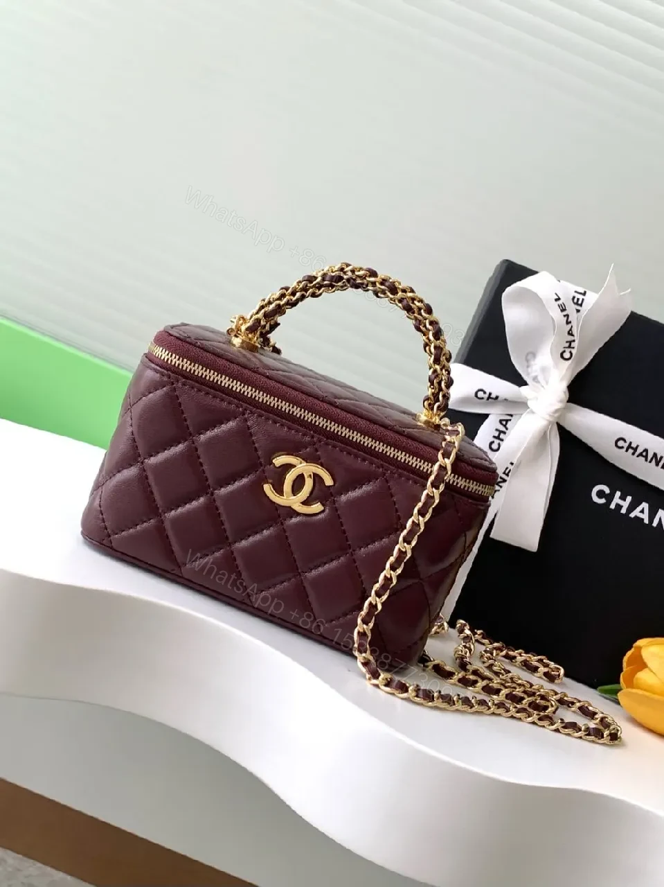 Quilted Burgundy Bag with Gold Chain Handle—Compact Luxury — view 1