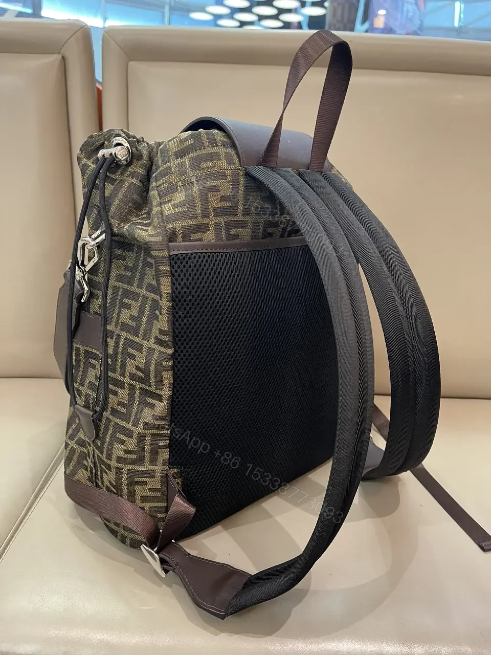 View 8 of Brown/Olive Modern Backpack with Fendi Monogram, Leather Accents, Gray Flap