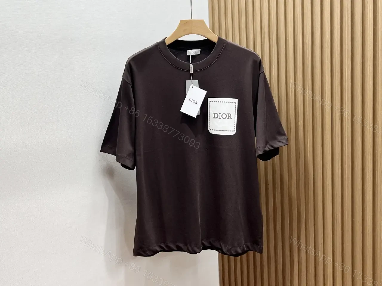 View 5 of Minimalist White Tee with Dior Pocket: Subtle Luxury T-Shirt