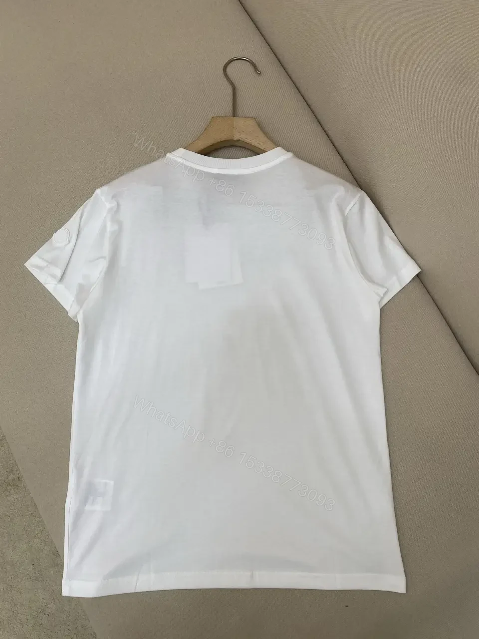 View 4 of Minimalist White Cotton Tee — Premium Logo Crewneck, Streetwear Style