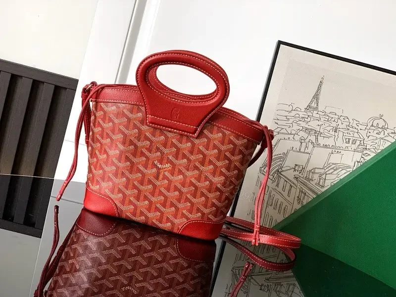Compact Luxury Handbag: Red Leather Trim, Iconic Pattern — view 1