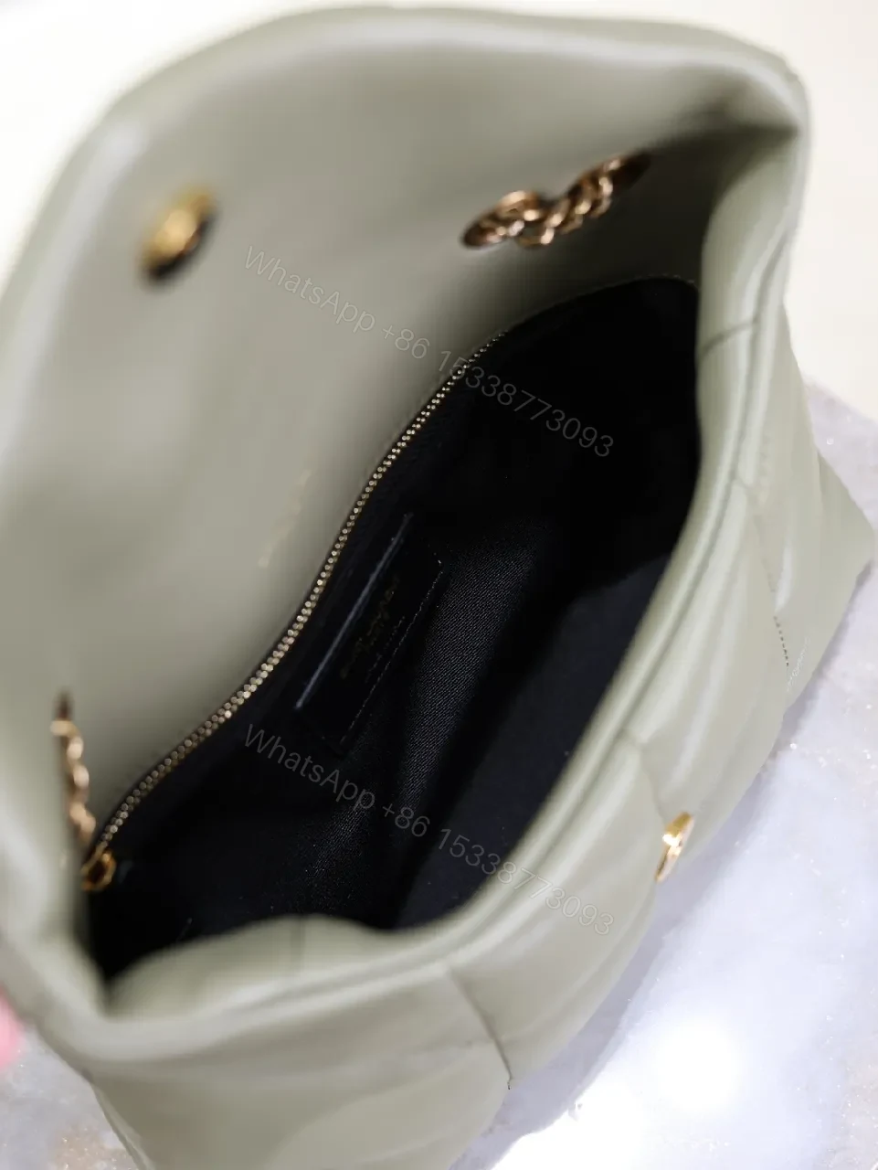View 4 of Textured Olive Quilted Shoulder Bag with Gold Emblem, Compact Elegant Style