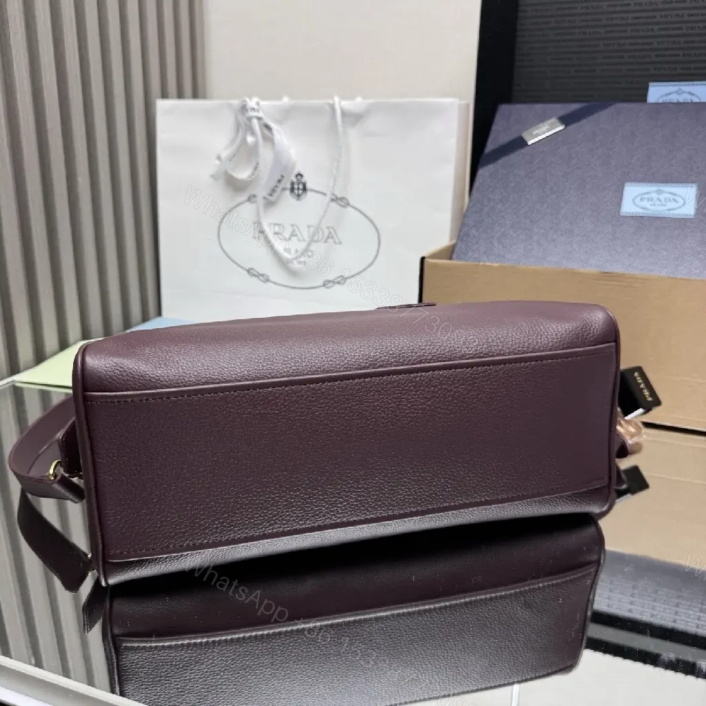 View 9 of Structured Burgundy Pebble-Leather City Bag with Gold Hardware