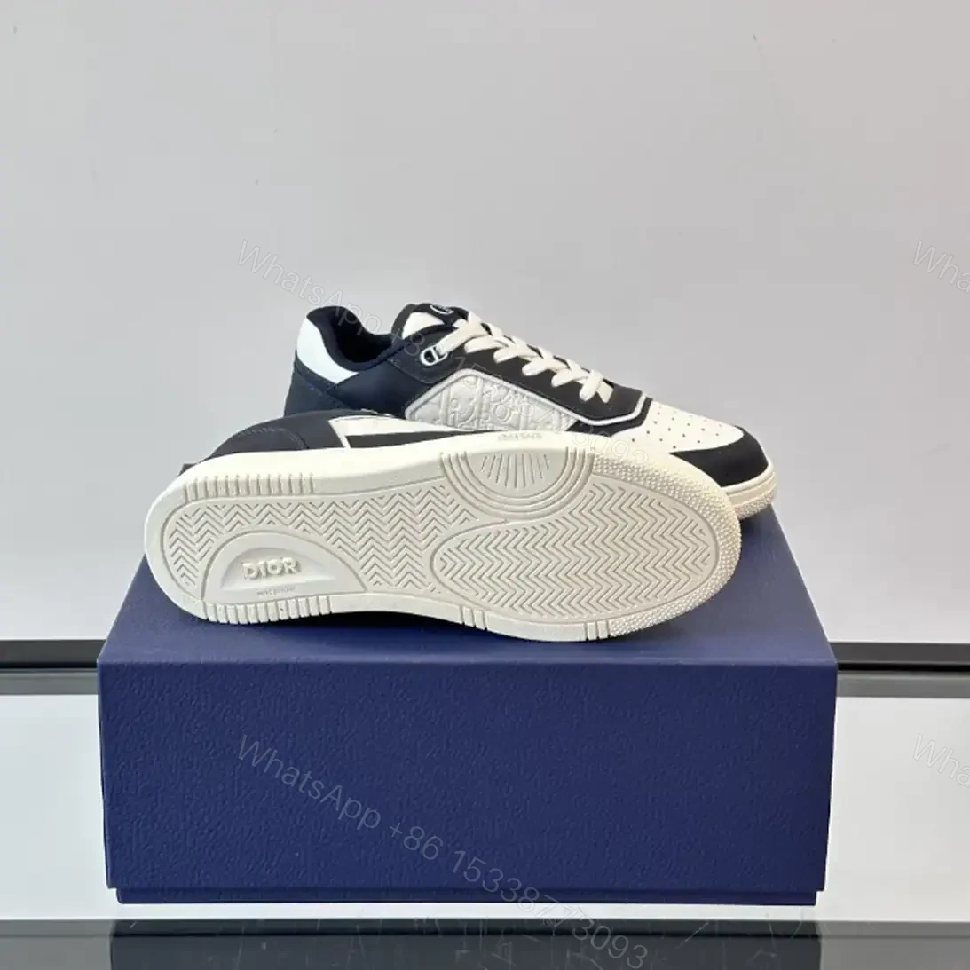 View 4 of DIOR B27 UPTOWN LOW-TOP SNEAKERS NAVY BLUE AND WHITE GRAINED CALFSKIN WITH WHITE GRAVITY LEATHER – CD222