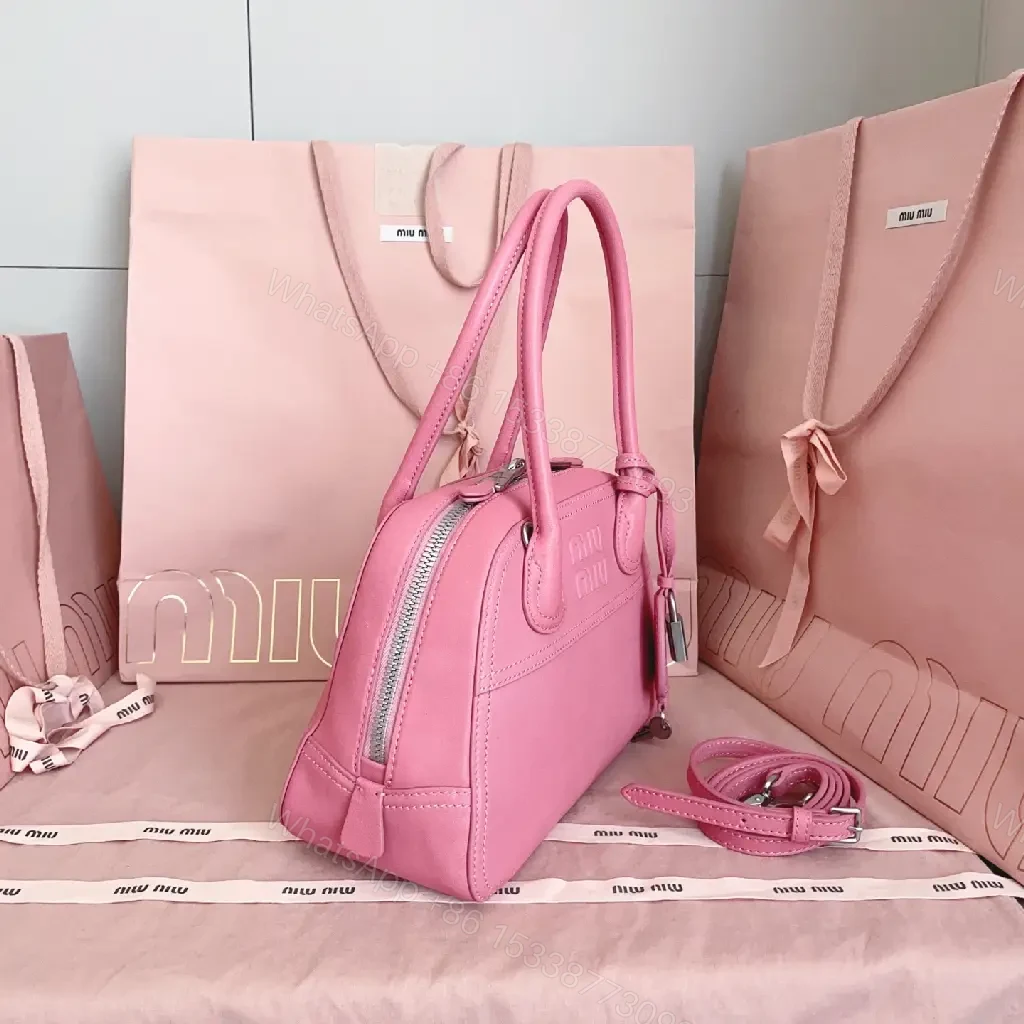 View 7 of Light Pink Leather Dome Satchel: Top-Handle Bag with Shoulder Strap
