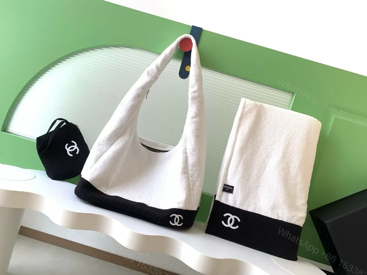 View 4 of White Fabric Handbag with Black Trim Slouchy Style Chanel Logo Tote