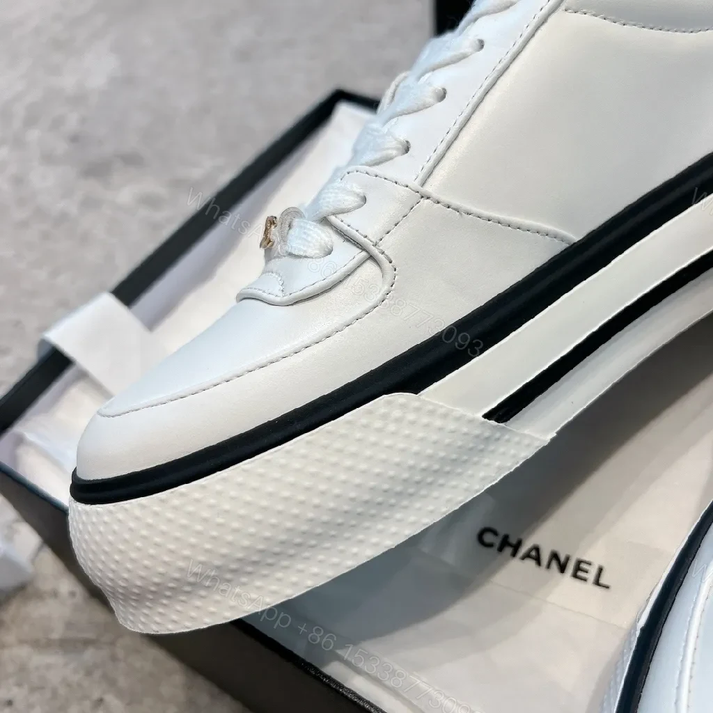 View 8 of White Leather High-Top Sneakers with Subtle Hardware Details