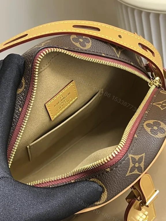 View 3 of Monogram Round Bag: Luxe City Carryall in Canvas