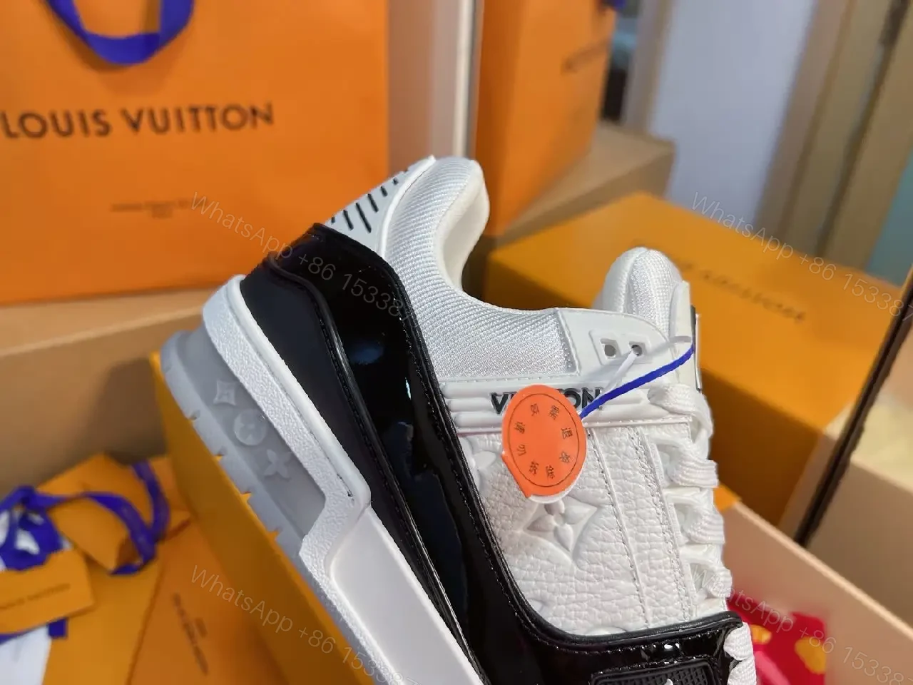 View 5 of Two-Tone Luxe Sneaker: Premium Comfort & Monogram Accent
