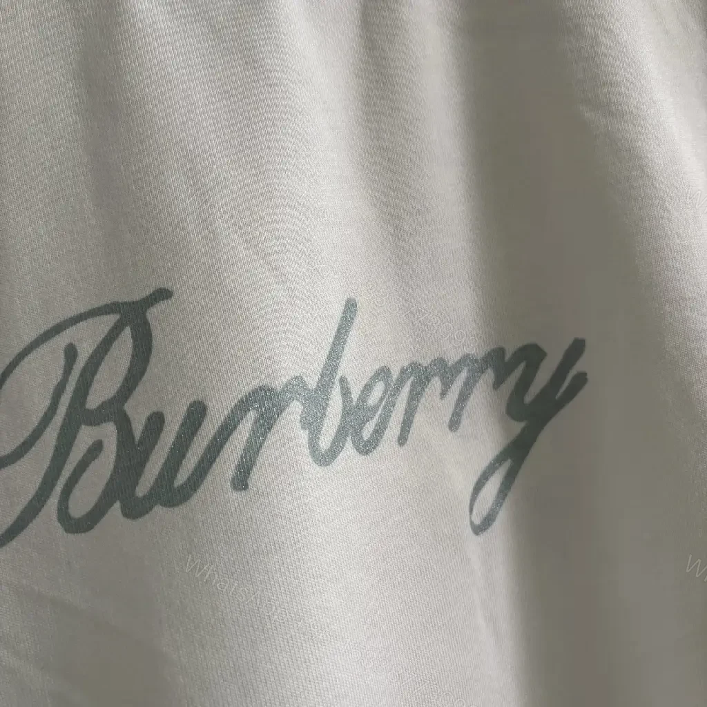 View 7 of Minimalist White Jersey Tee, Premium Comfort, Relaxed Fit, Everyday Style