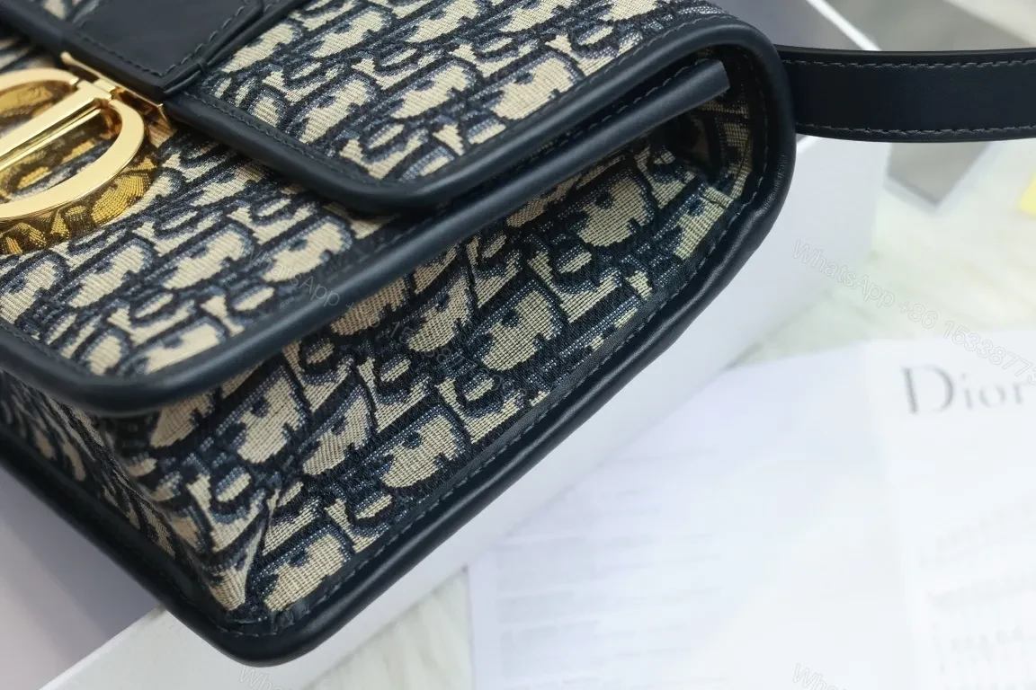 View 2 of Crossbody Bag: Monogram Pattern, Black Leather, Compact, Gold Clasp