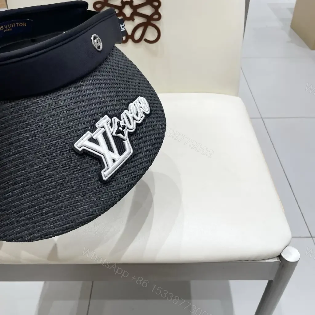 View 5 of Bold Sun Visor with LV Flair: Luxury-Casual Headwear