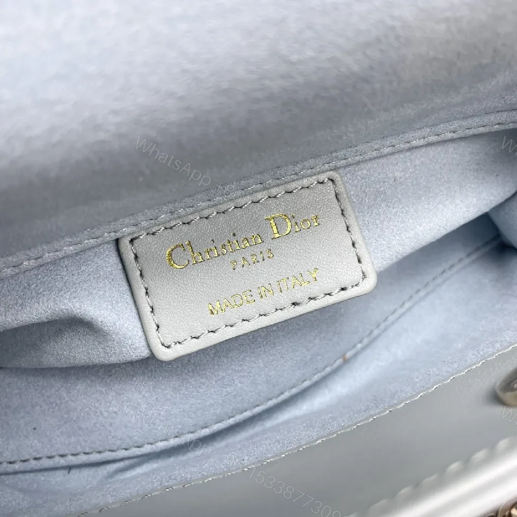 View 9 of Soft-Texture Quilted Mini Bag with Gold Charms, Calfskin, Elegant Chic, Luxury Carryall