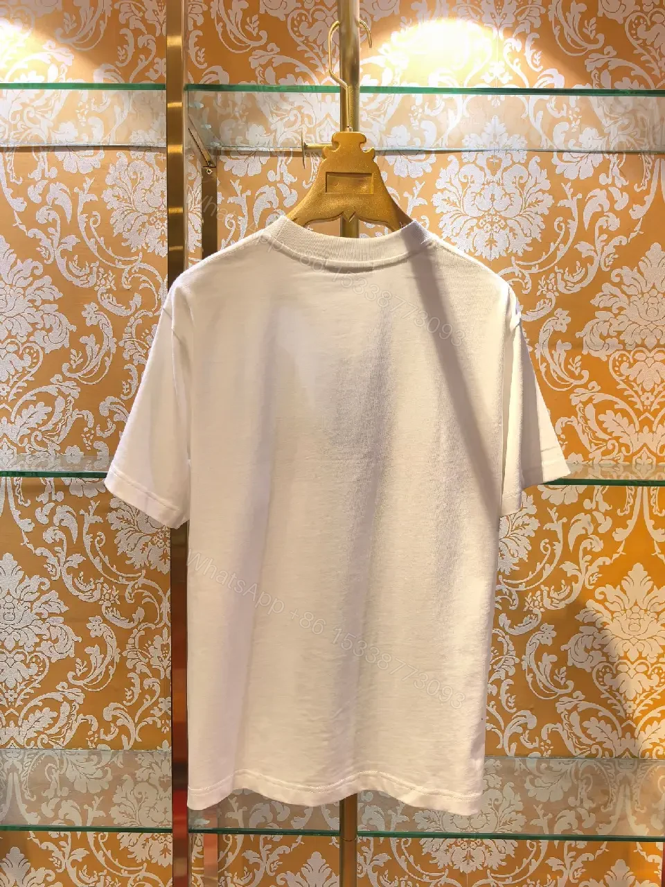 View 3 of White Cotton Crew Tee, Minimalist Luxe, PRADA Milano Logo Tee