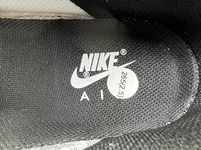 View 5 of Black Leather Low-Top Sneakers with Signature Swoosh