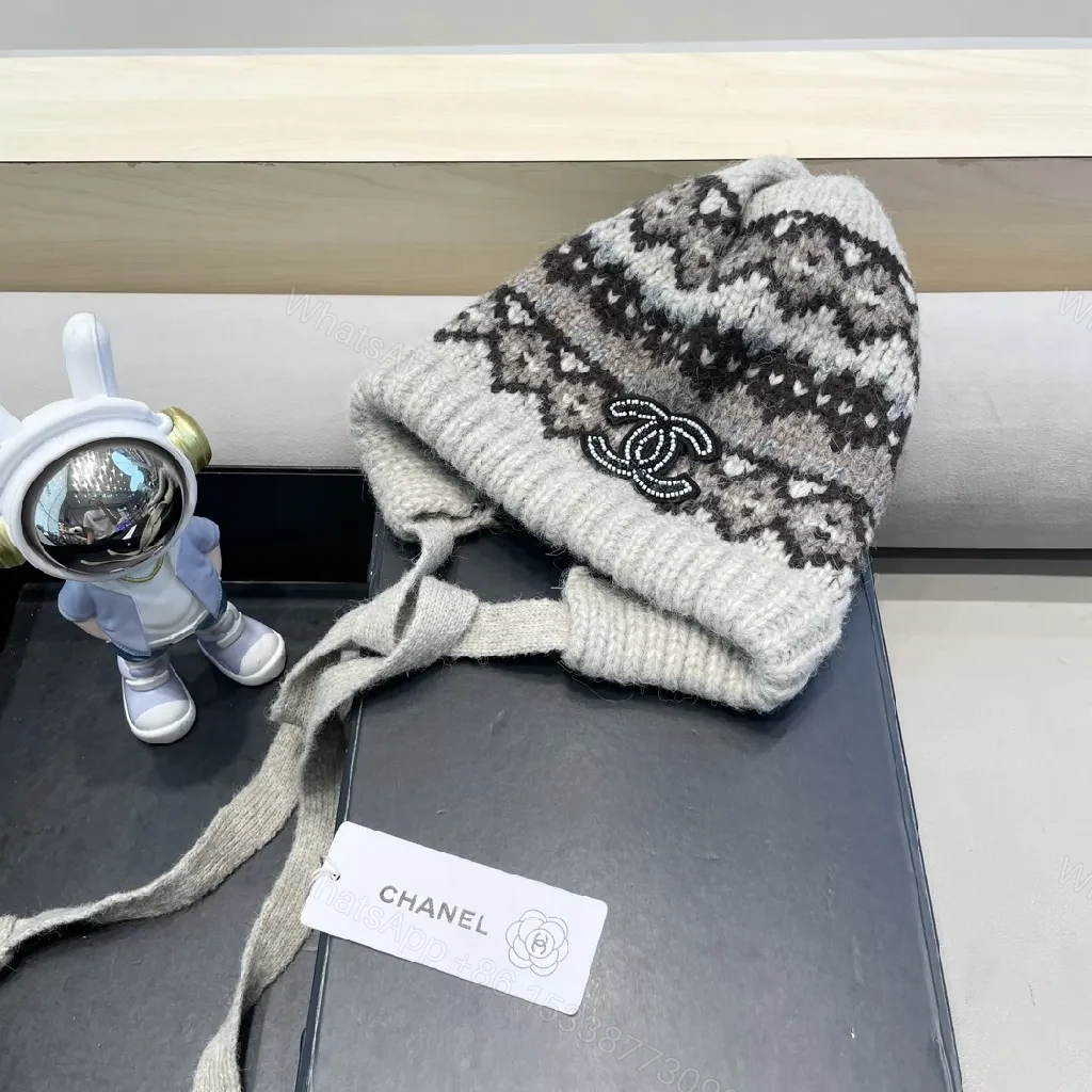 View 2 of Marled Knit Hat with Logo & Ear Flap Detail – Cozy Luxe