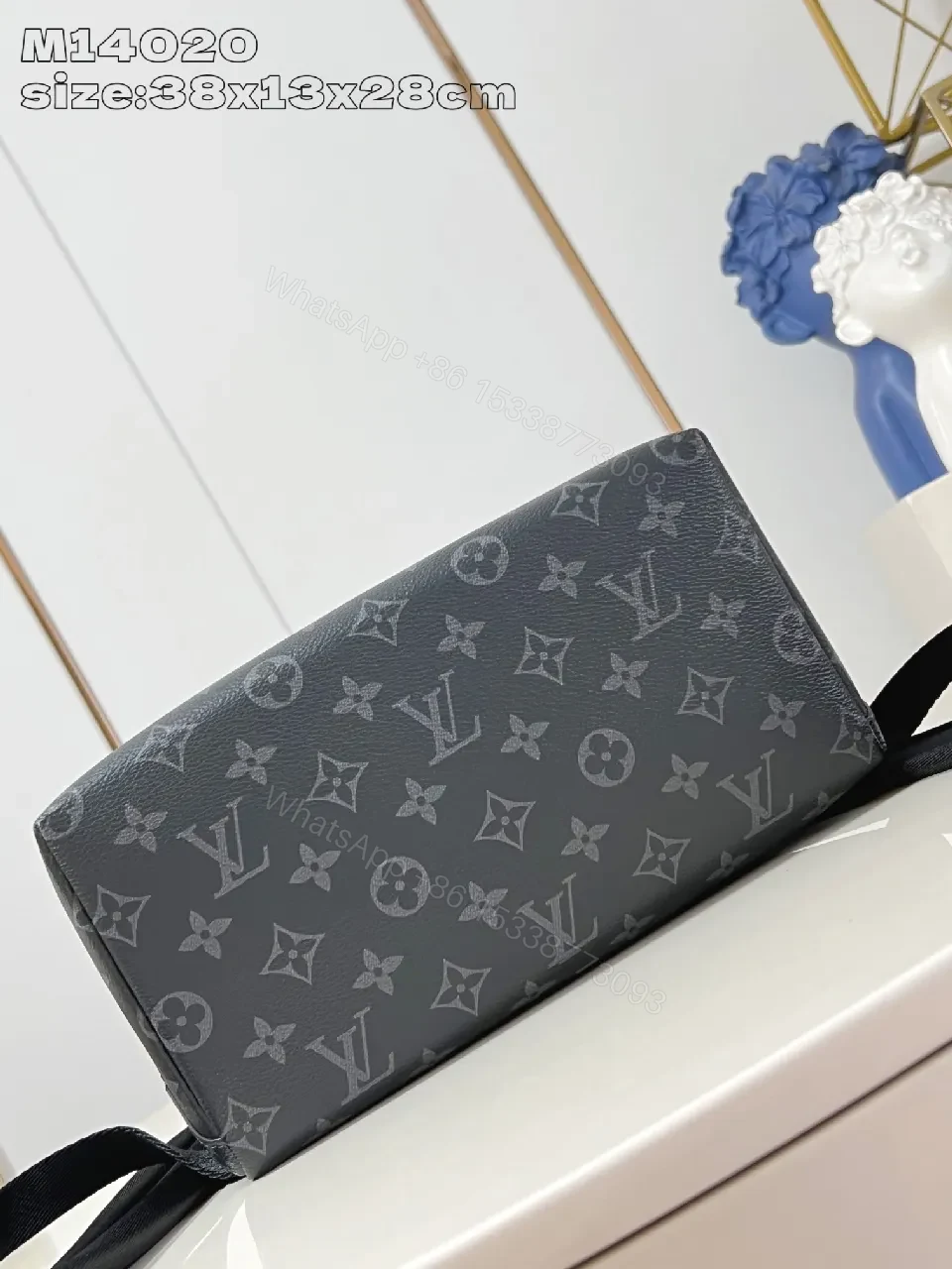 View 5 of Compact Monogram Canvas Backpack: Subtle Luxury, Everyday Utility