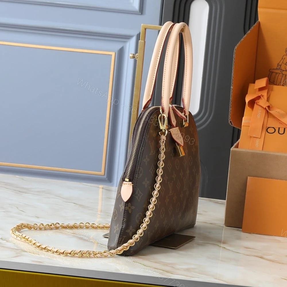 View 3 of Louis Vuitton Moon Alma Bag Monogram Brown 38Cm