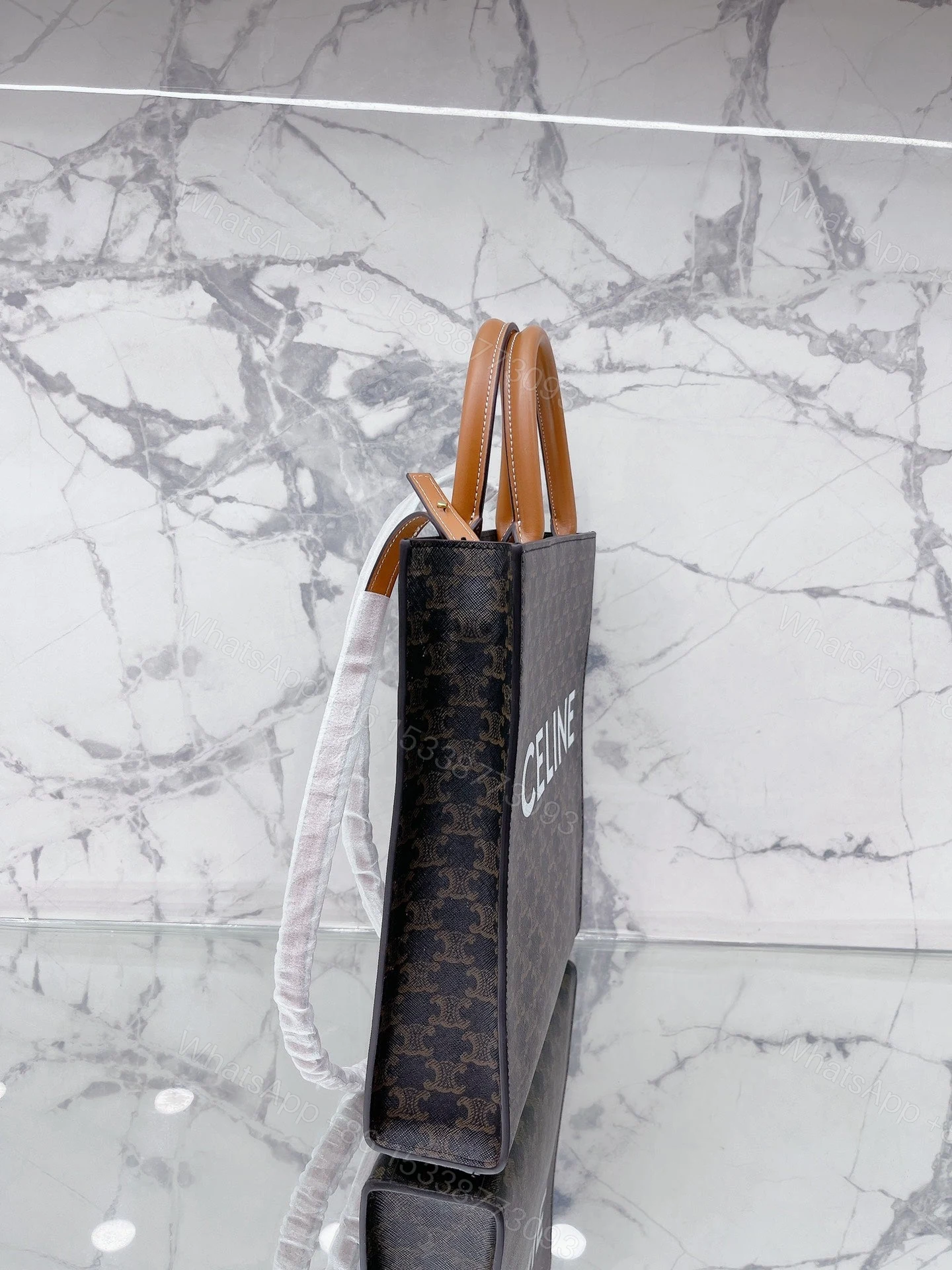 View 3 of CELINE MINI VERTICAL CABAS IN TRIOMPHE CANVAS AND CALFSKIN WITH PRINT 20CM 194372BZK04LU