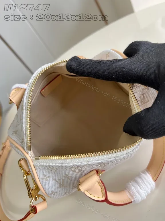 View 6 of Chic Monogram Satchel in Canvas â€“ Structured Luxury Bag