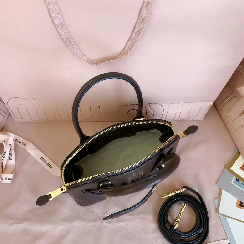 View 3 of Compact Pebbled Leather Satchel with Gold Hardware