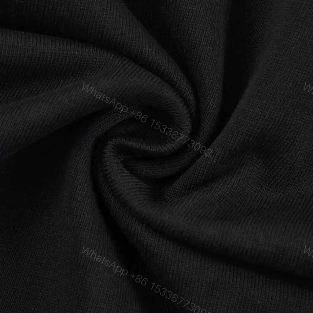 View 8 of Minimalist Black Cotton Tee: Subtle Luxury, Everyday Essential