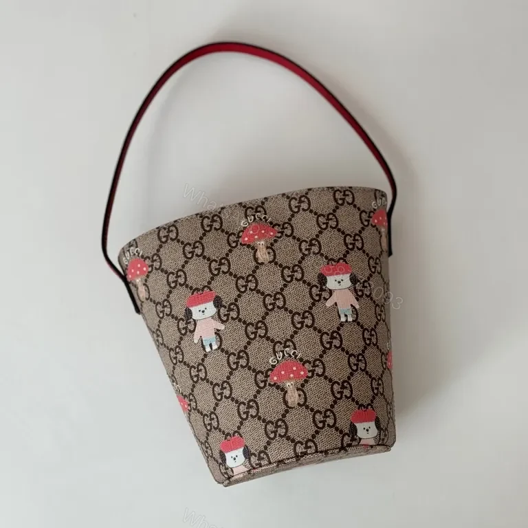 View 3 of Mini Bucket Bag GG Supreme with Toasted Icons - Daily Luxury