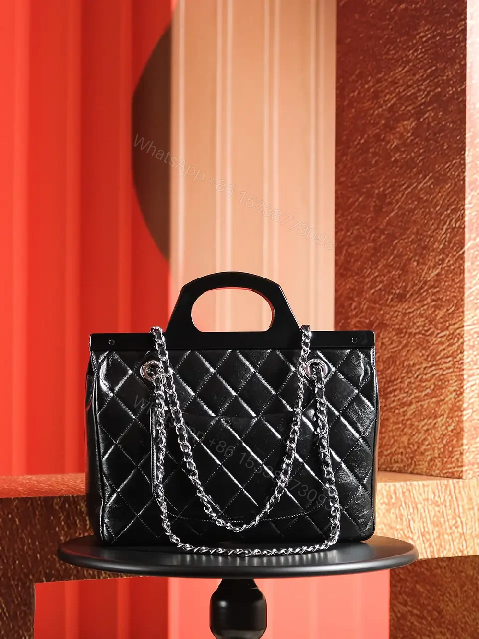 View 3 of Black Quilted Leather Handbag - Classic Chic, Compact Luxury