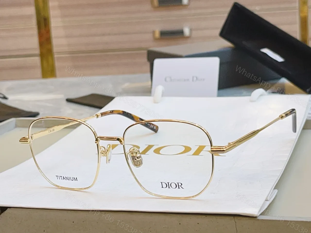 View 5 of Elegant Titanium Rim Eyewear: Subtle Designer Accents Suiting Any Look