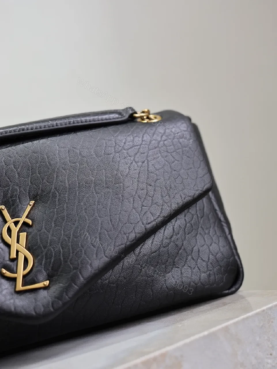 View 8 of Textured Leather Crossbody Clutch with Gold Logo hardware