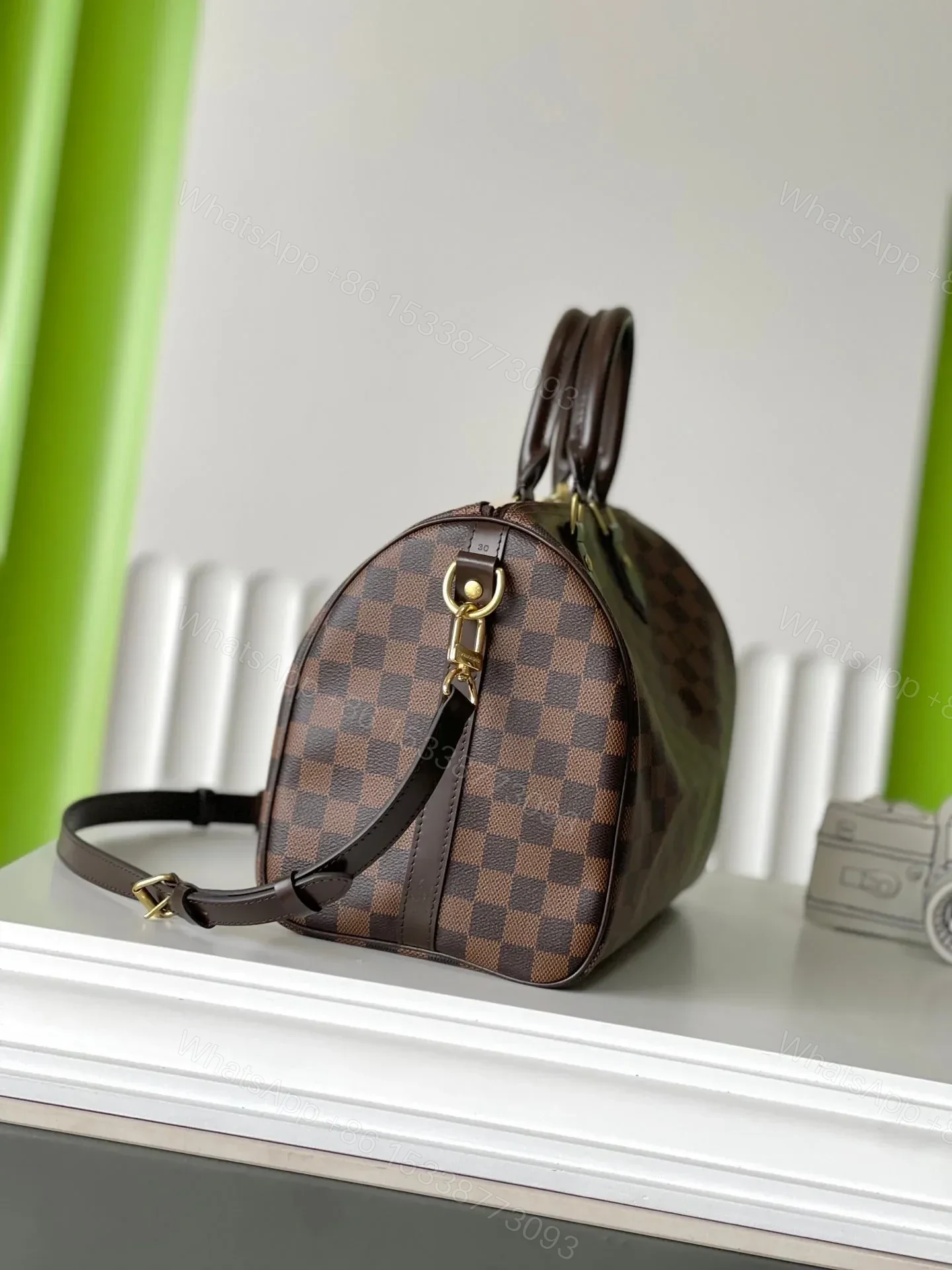 View 6 of LV SPEEDY BANDOLIÈRE 30 IN DARK BROWN DAMIER EBENE CANVAS GOLD LOCK