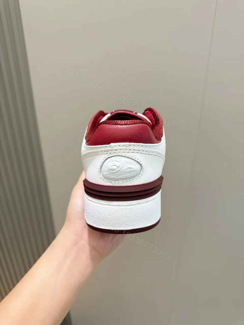 View 2 of White Leather Burgundy Accented Low-Top Sneakers: Modern Luxury Style
