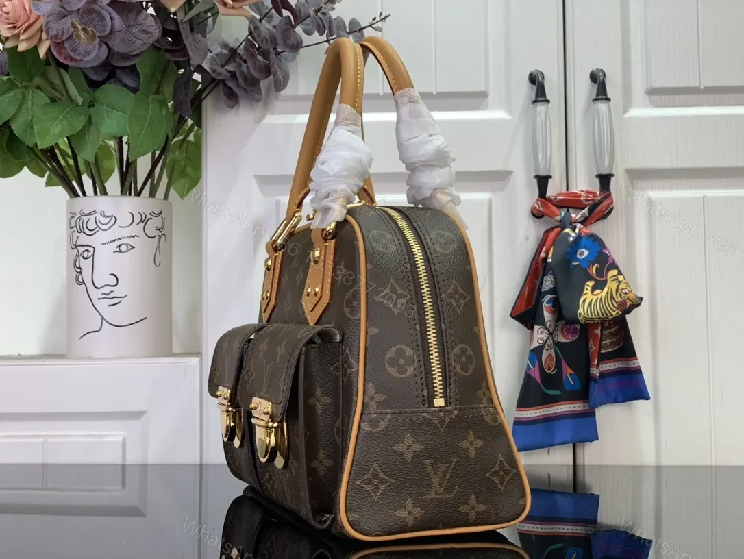 View 9 of Structured Luxury Monogram Handbag with Gold Hardware and Leather Trim