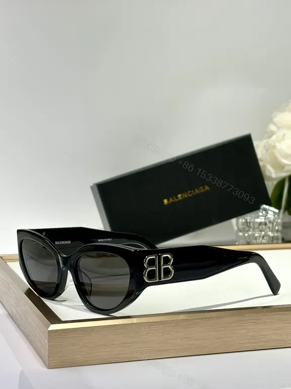 View 8 of Bold Black Frames with Gold BB Emblem Sunglasses