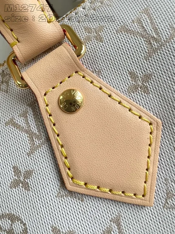 View 3 of Chic Monogram Satchel in Canvas â€“ Structured Luxury Bag